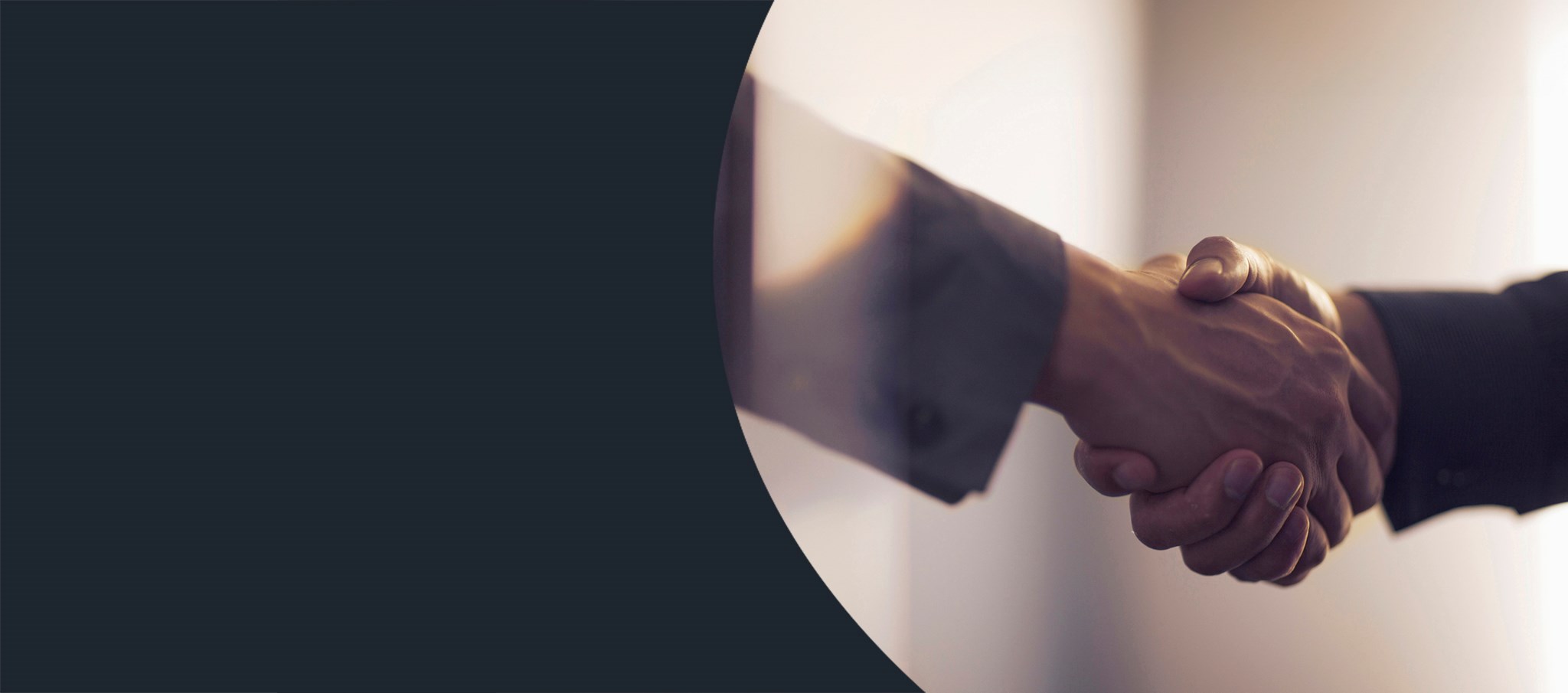 close up to two men hands shake