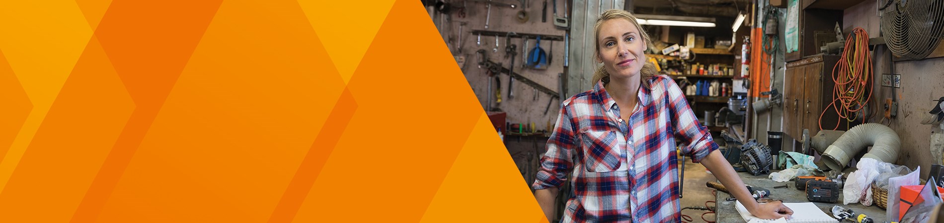 woman in plaid shirt in workshop