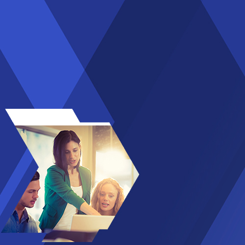  Woman helping two people on a laptop